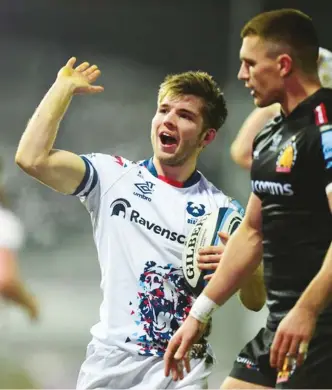  ??  ?? Having a rumble: Harry Randall celebrates his try against Exeter