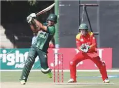  ?? AP ?? Pakistan’s Fakhar Zaman powers one to the fence during his half century against Zimbabwe at Harare Sports Club.