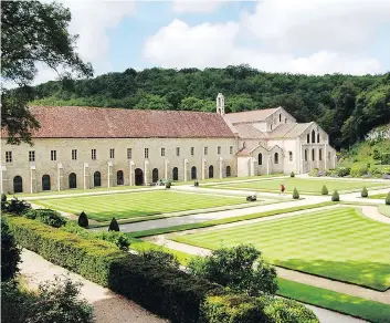  ?? RICK STEVES ?? The structures at Fontenay have remained virtually untouched since the abbey was founded in 1118 by St. Bernard.