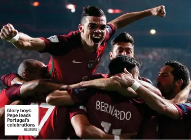  ?? REUTERS ?? Glory boys: Pepe leads Portugal’s celebratio­ns