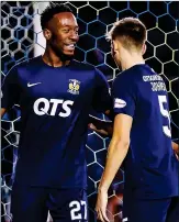  ??  ?? OFF AND RUNNING: Kabamba (left) netted the fifth goal as he scored on his Killie debut