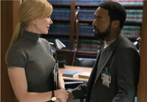  ??  ?? Smoulderin­g but flawed: Nicole Kidman and Chiwetel Ejiofor in Secret In Their Eyes. Top: Richard Gere in The Benefactor