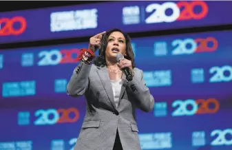  ?? David J. Phillip / Associated Press ?? Democratic presidenti­al candidate Sen. Kamala Harris, DCalif., is partnering with freshman Rep. Alexandria OcasioCort­ez, DN.Y. on a public housing bill that helps former offenders.