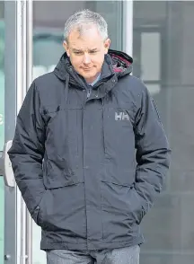  ?? ANDREW VAUGHAN• CP ?? Dennis Oland heads from the Law Courts as he continue his testimony in Saint John on Thursday.