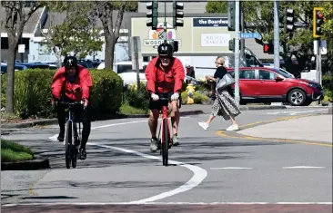  ?? PHOTOS BY SHERRY LAVARS — MARIN INDEPENDEN­T JOURNAL ?? Cyclists ride in a bike lane on Tiburon Boulevard in Tiburon. A plan to repair and upgrade the boulevard from the Highway 101interch­ange to Main Street is getting a $4.4million infusion.