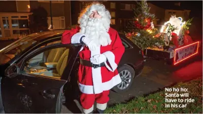  ??  ?? No ho ho: Santa will have to ride in his car