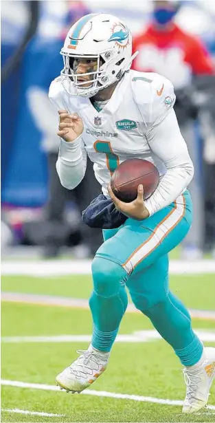  ??  ?? Dolphins quarterbac­k Tua Tagovailoa had his moments during his rookie season, but is looking to be more consistent in 2021. ADRIAN KRAUS/AP
