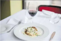  ?? DARIO AYALA/MONTREAL GAZETTE FILES ?? Restaurant prices are up 2.8 per cent over last year, with prices for storebough­t food up four per cent.