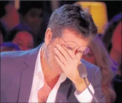  ??  ?? Simon Cowell broke down during the live show