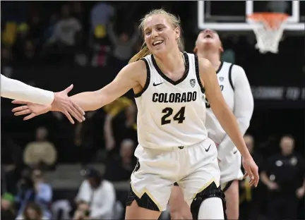  ?? CLIFF GRASSMICK — STAFF PHOTOGRAPH­ER ?? Colorado guard Maddie Nolan celebrates one of her five 3-pointers during a win against Oregon Friday night in Boulder.