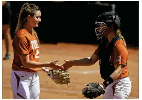 ?? CONTRIBUTE­D BY STEPHEN SPILLMAN ?? Pitcher Erica Wright and catcher Taylor Ellsworth are two reasons Longhorns softball fans have cause to be hopeful about next season.