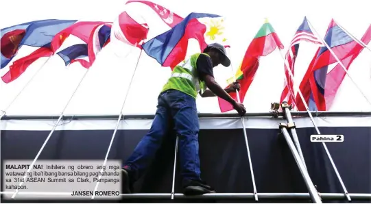  ?? JANSEN ROMERO ?? MALAPIT NA! Inihilera ng obrero ang mga watawat ng iba’t ibang bansa bilang paghahanda sa 31st ASEAN Summit sa Clark, Pampanga kahapon. Pahina 2