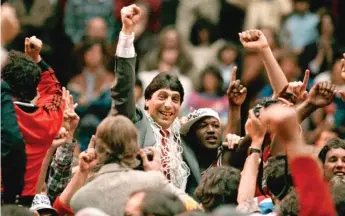  ?? AP ?? N.C. State coach Jim Valvano celebrates his team’s stunning victory against Houston for the NCAA title in 1983.