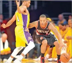  ?? AFP ?? Portland Trail Blazers point guard Damian Lillard says he will travel with his team, but he won’t play if their playoff chances are nil.