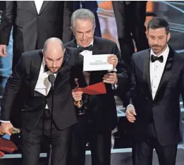  ??  ?? We’re bound to see presenters hold up the card with the best-picture winner on it, after last year’s “La La Land”/“Moonlight” fiasco. Jordan Horowitz had to tell us of the mistake last year. KEVIN WINTER/GETTY IMAGES