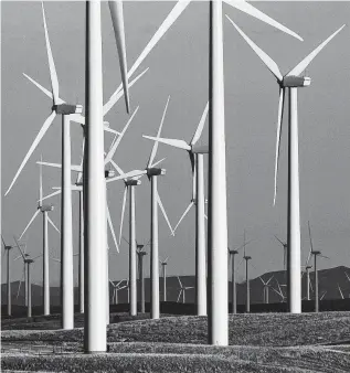  ?? Associated Press file photo ?? Land-based turbines are rising by the thousands across the U.S., mainly in red states.