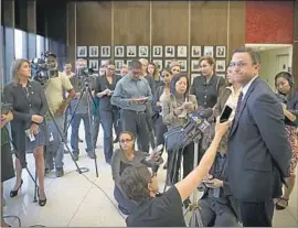  ?? Allen J. Schaben Los Angeles Times ?? SENIOR Deputy Dist. Atty. Steve McGreevy, right, addresses reporters after the arraignmen­t of Samuel Woodward, who is accused of stabbing Blaze Bernstein.