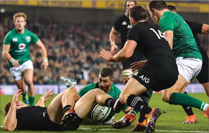  ??  ?? Rob Kearney of Ireland touches down only for the try to be disallowed by the TMO.