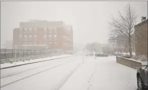  ??  ?? A nor’easter moved into Torrington 0n Wednesday afternoon, bringing an estimated 17 inches of snow, according to the National Weather Service.