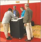  ?? Jeff Mill / Hearst Connecticu­t Media ?? Cromwell officials tally the votes from Tuesday night’s budget referendum.