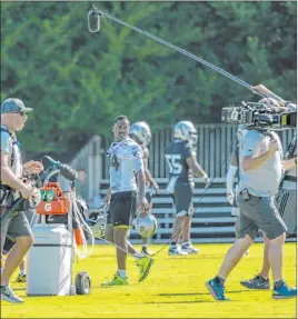  ?? Heidi Fang Las Vegas Review-journal @Heidifang ?? Raiders wide receiver Antonio Brown (84) walks the sidelines as an HBO “Hard Knocks” crew follows him during training camp Sunday in Napa, Calif.