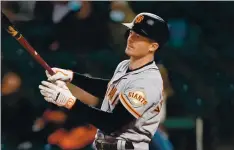  ?? TED S. WARREN — THE ASSOCIATED PRESS ?? The San Francisco Giants’ Mike Yastrzemsk­i bats against the Seattle Mariners on Saturday in Seattle.