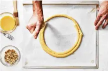  ?? ?? A second line of pastry dough is piped along the inside of a circle at a different point from the first for a Paris-Brest recipe.