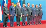  ?? AP ?? ▪ Prime Minister Narendra Modi with other leaders of SCO member countries in Qingdao on Sunday.