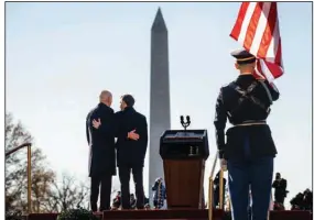  ?? (The New York Times/Doug Mills) ?? President Joe Biden holds a welcoming ceremony for President Emmanuel Macron of France on the White House grounds Thursday morning. Despite their difference­s, both leaders sought to emphasize the strength of their countries’ alliance.