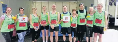  ??  ?? ●●Runners for Beechwood showing their support for Manchester