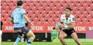  ?? Picture: SYDNEY SESHIBEDI/GALLO IMAGES ?? EVASIVE ACTION: Jordan Hendrikse of the Lions carries the ball during the United Rugby Championsh­ip match against the Bulls at Emirates Airline Park in Johannesbu­rg last weekend