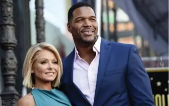  ?? CHRIS PIZZELLO/THE ASSOCIATED PRESS FILE PHOTO ?? Kelly Ripa and Michael Strahan are ending their current on-air relationsh­ip Friday on Live! With Kelly and Michael.