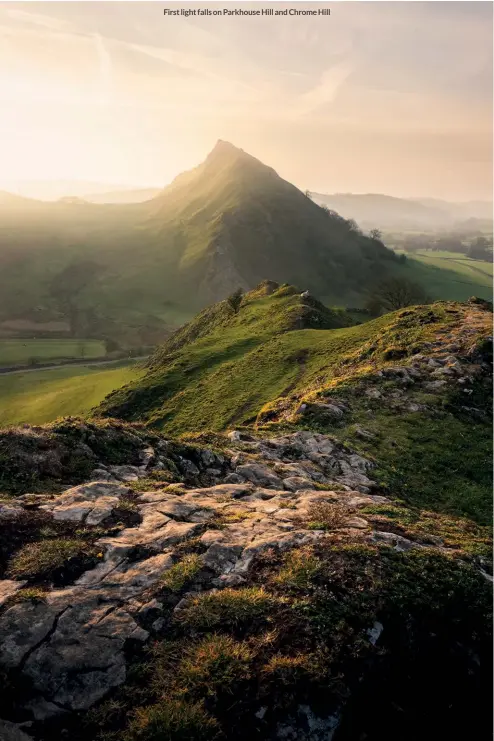  ?? ?? First light falls on Parkhouse Hill and Chrome Hill