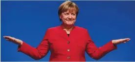  ??  ?? ESSEN: German Chancellor Angela Merkel gestures after addressing delegates during her conservati­ve Christian Democratic Union (CDU) party’s congress in Essen, western Germany yesterday. German Chancellor Angela Merkel launches into campaign mode for...