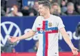  ?? AFP ?? Barcelona’s Robert Lewandowsk­i reacts during a match.