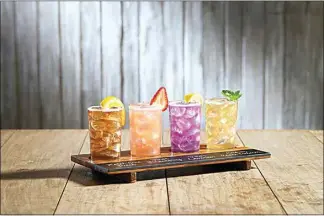 ?? COURTESY OF BJ’S RESTAURANT & BREWHOUSE ?? Now through July 6, BJ’s Restaurant & Brewhouse is offering a brand-new Twisted Lemonade + Tea Flight, which features four tastings of BJ’s favorite twisted lemonades and teas, including Ketel One Peach Bliss Tea, Tito’s Strawberry Lemonade, Tito’s Lavender Lemonade, and Crown Apple Arnold Palmer.