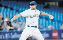  ?? TORONTO STAR FILE PHOTO ?? Tim Mayza of the Blue Jays delivers a pitch during a game against the Seattle Mariners at the Rogers Centre in Toronto on May 10.