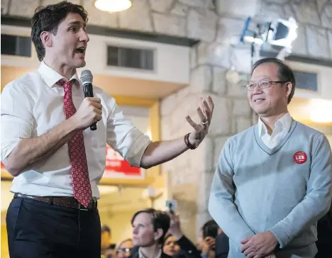  ?? DARRYL DYCK/THE CANADIAN PRESS ?? Prime Minister Justin Trudeau stumps for Liberal federal byelection candidate Richard T. Lee on Sunday in the Burnaby South riding. The Liberals face many challenges in the race, including Lee being questioned about his ties to the Chinese Communist Party.