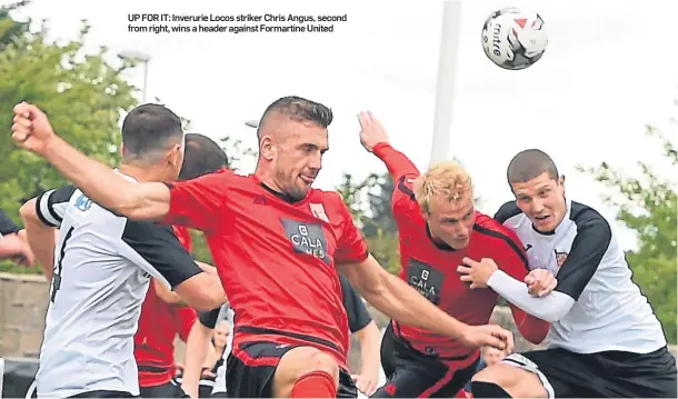  ??  ?? UP FOR IT: Inverurie Locos striker Chris Angus, second from right, wins a header against Formartine United