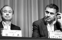  ?? PHOTO: BLOOMBERG ?? Masayoshi Son, chairman and CEO of SoftBank Group Corp (left), with Nikesh Arora, then president and chief operating officer, during a news conference in Tokyo on May 10, 2016