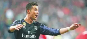  ?? MICHAEL DALDER / REUTERS ?? Cristiano Ronaldo celebrates scoring Real Madrid’s second goal against Bayern Munich in their Champions League quarterfin­al first-leg match at Allianz Arena, Munich on Wednesday.