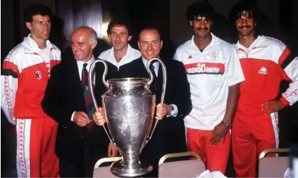  ?? Cup. Photograph: Imago/Shuttersto­ck ?? Silvio Berlusconi (centre) with Milan’s Marco van Basten, manager Arrigo Sacchi, Franco Baresi, Frank Rijkaard and Ruud Gullit in 1990 with the European