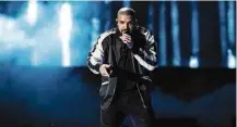  ?? Reprodução/”USA Today”/AP ?? » MARCO No ‘USA Today’, pela primeira vez a indústria fonográfic­a tirou mais da metade da receita nos EUA de serviços como Spotify, em 2016, com artistas como Drake