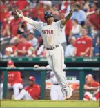  ?? Nick Wass / Associated Press ?? Boston’s Rafael Devers celebrates his two-run home run during the ninth inning against the Nationals on Sunday.