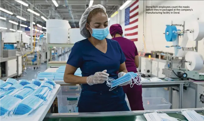  ?? DAVID SANTIAGO dsantiago@miamiheral­d.com ?? DemeTech employees count the masks before they’re packaged at the company’s manufactur­ing facility in Doral.