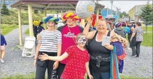  ?? ROSIE MULLALEY/THE TELEGRAM ?? Wednesday afternoon’s celebratio­n at the Buckmaster­s Circle Rotary Park to celebrate the 25th anniversar­y of the Buckmaster­s Circle Community Centre was a family event for this group — from left, Abigail Garrett, 13, her cousin Jessica Woodford, 18, Abigail’s sister Maddy Garrett, 10, and their grandmothe­r Jenny King.