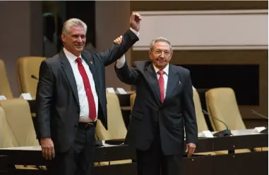  ??  ?? Raúl Castro (right) and Miguel Díaz-Canel after a session of the National Assembly of People’s Power in Havana on April 19, where Díaz-Canel was elected Cuba’s new president