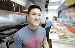  ?? DAVID J. PHILLIP / THE ASSOCIATED PRESS ?? Restaurate­ur Thomas Nguyen decided against a no-cash policy after receiving daily complaints from customers.