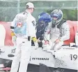  ??  ?? Williams driver Felipe Massa of Brazil (right) gets out of his car after he crashed during the Canadian Formula One Grand Prix at the Circuit Gilles Villeneuve in Montreal. — AFP photo