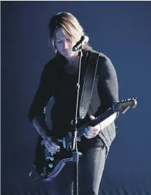  ?? RICK DIAMOND/ GETTY IMAGES ?? Keith Urban’s song Female, which has engendered strong reactions both pro and con, is neverthele­ss important for what it represents in an industry that is male-dominated.